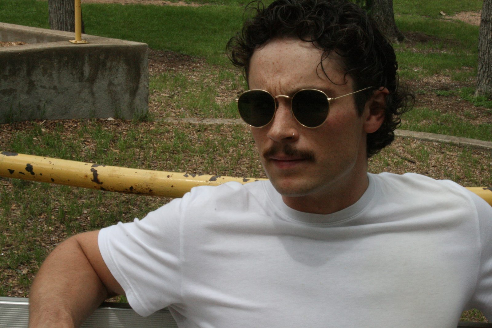 Portrait outdoors in sunglasses